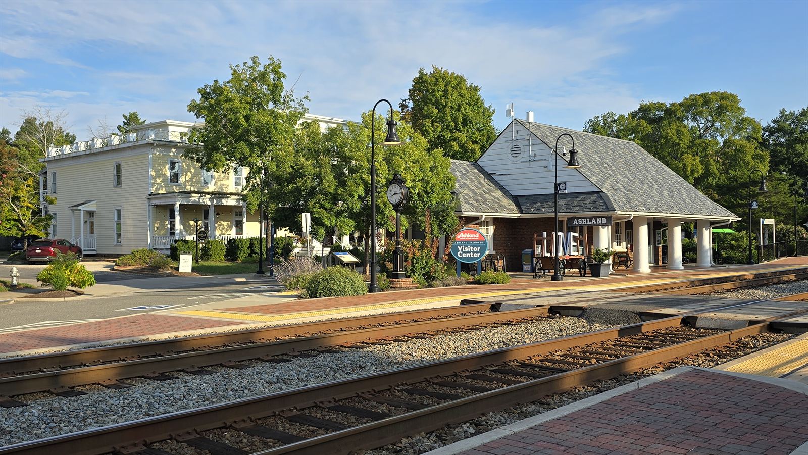 The Ashland, Virginia train station and visitor center beside the railroad tracks in downtown Ashland